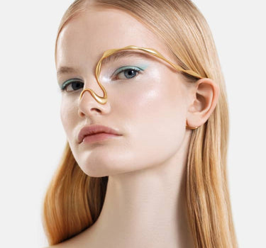 joya facial de forma orgánica de oro