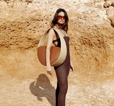 Bolso grande redondo de rafia