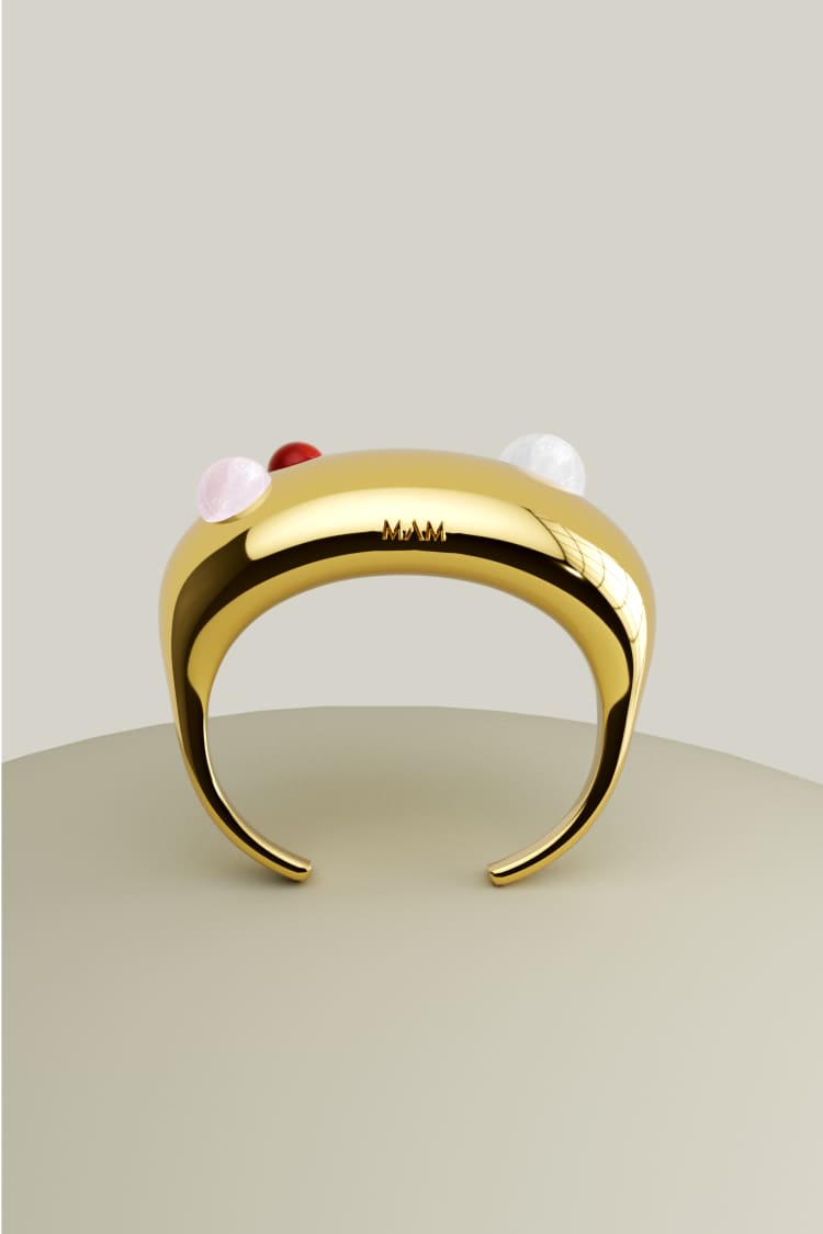 Brazalete de oro con piedras
