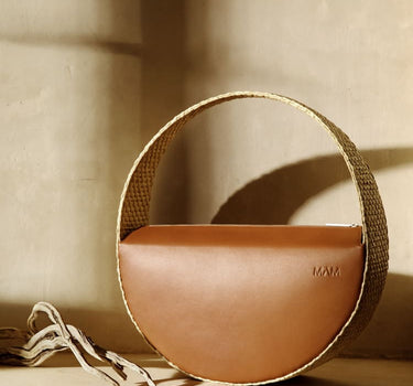 Bolso grande redondo de rafia