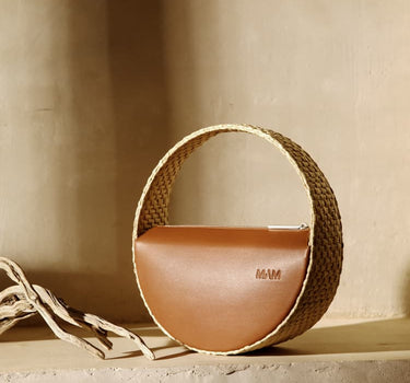Bolso pequeño redondo de rafia