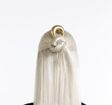 Pinza para el cabello en forma de gota de agua en oro de 24 quilates