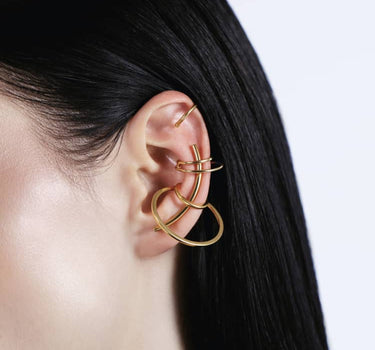 Conjunto de ear cuffs y ear climber en oro