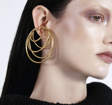 Ear cuff de aro de oro con múltiples espirales