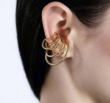 Ear cuff con espirales de oro