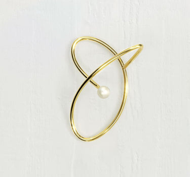 Ear cuff de oro con perla