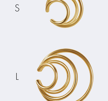 Ear cuff con espirales de oro